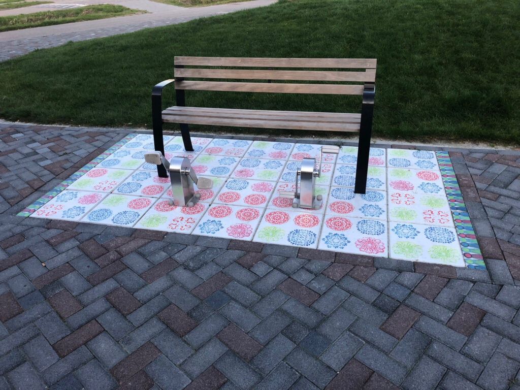 Printtegels als vloerkleed in het park